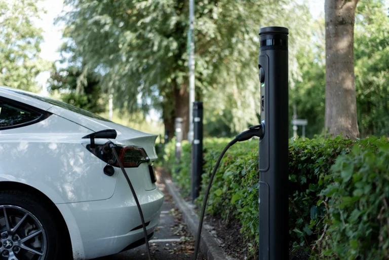 Electric car charging at a commercial charging bay