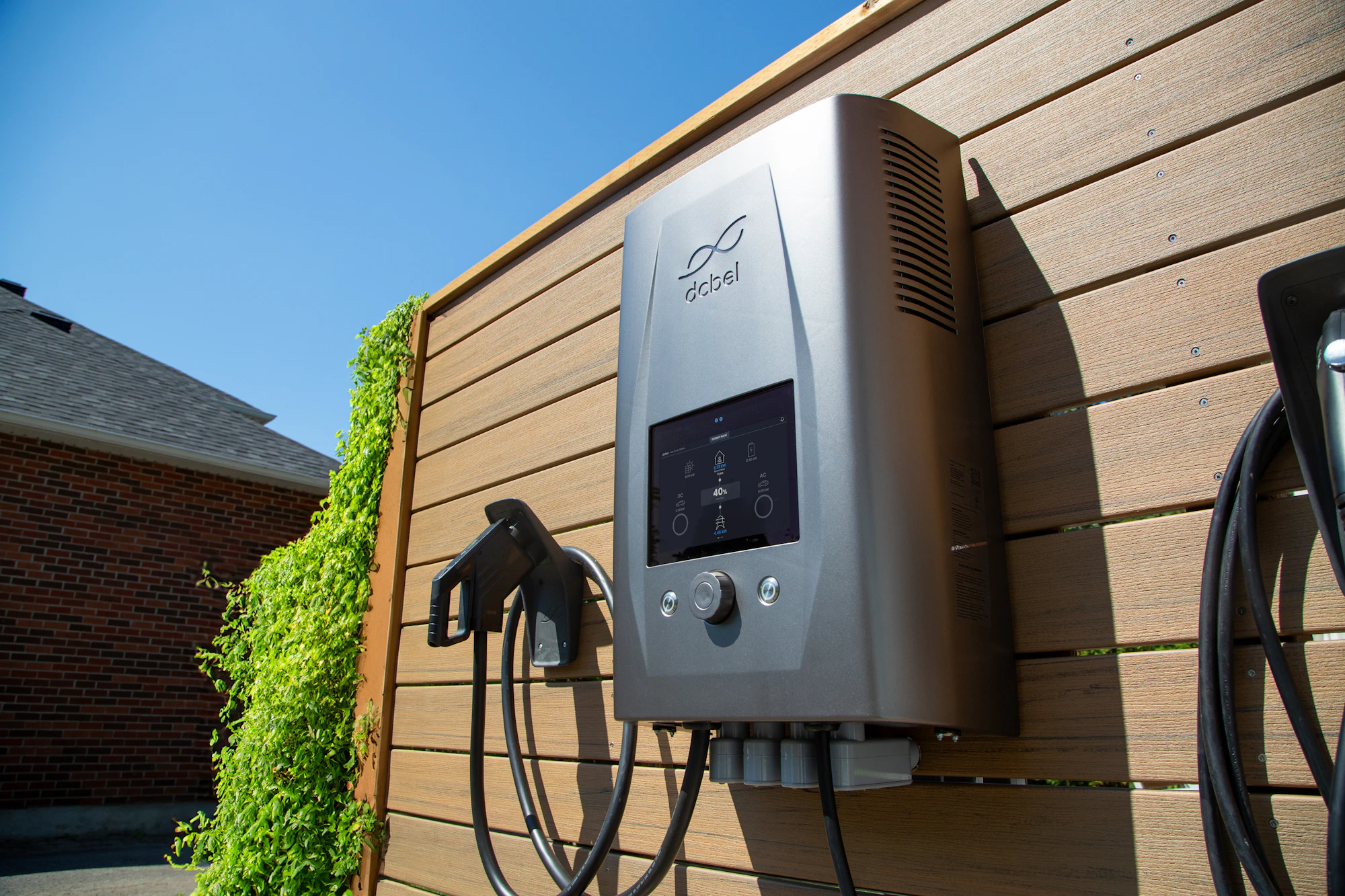 Smart home EV charger mounted on a timber wall